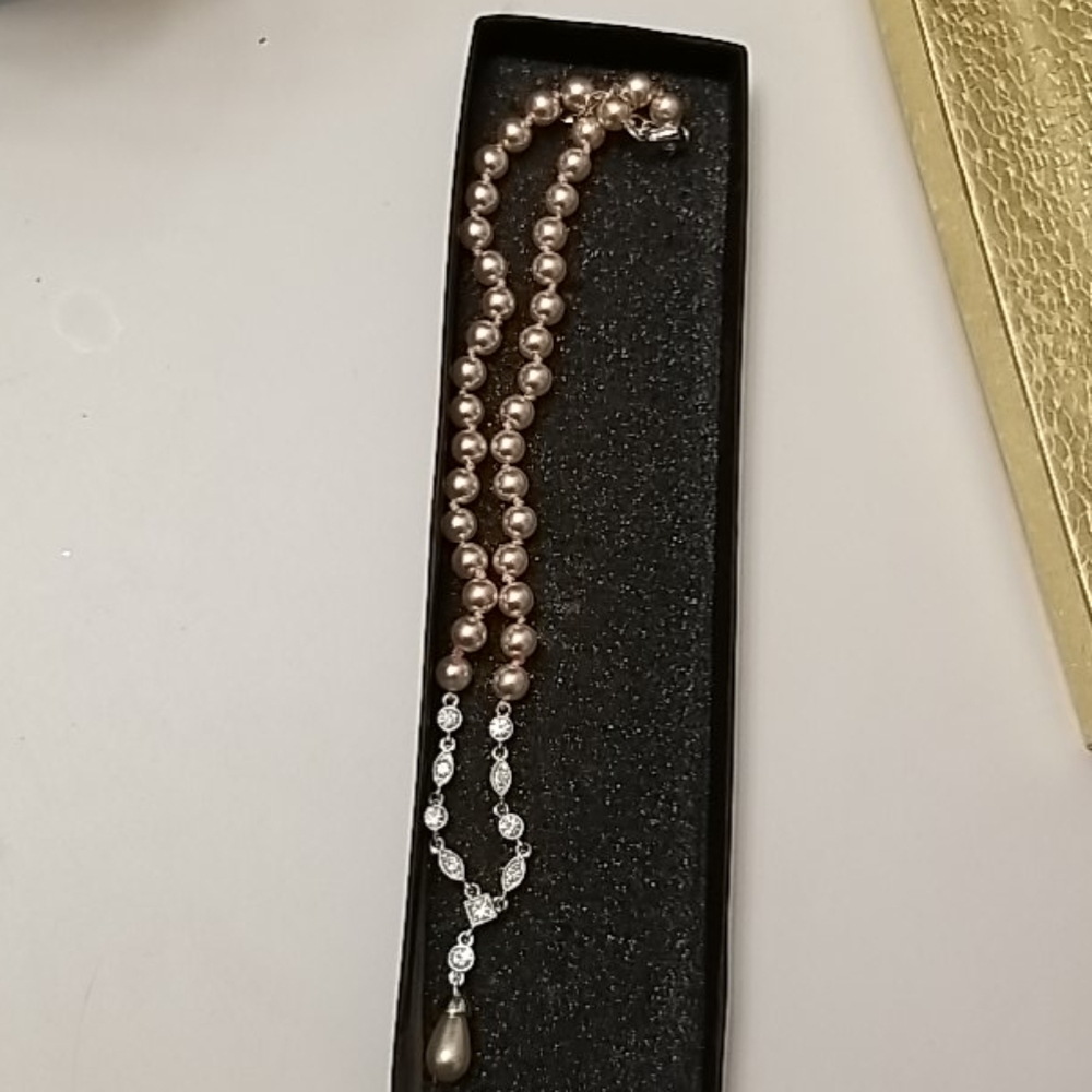 Diamond and rose gold pearl necklace